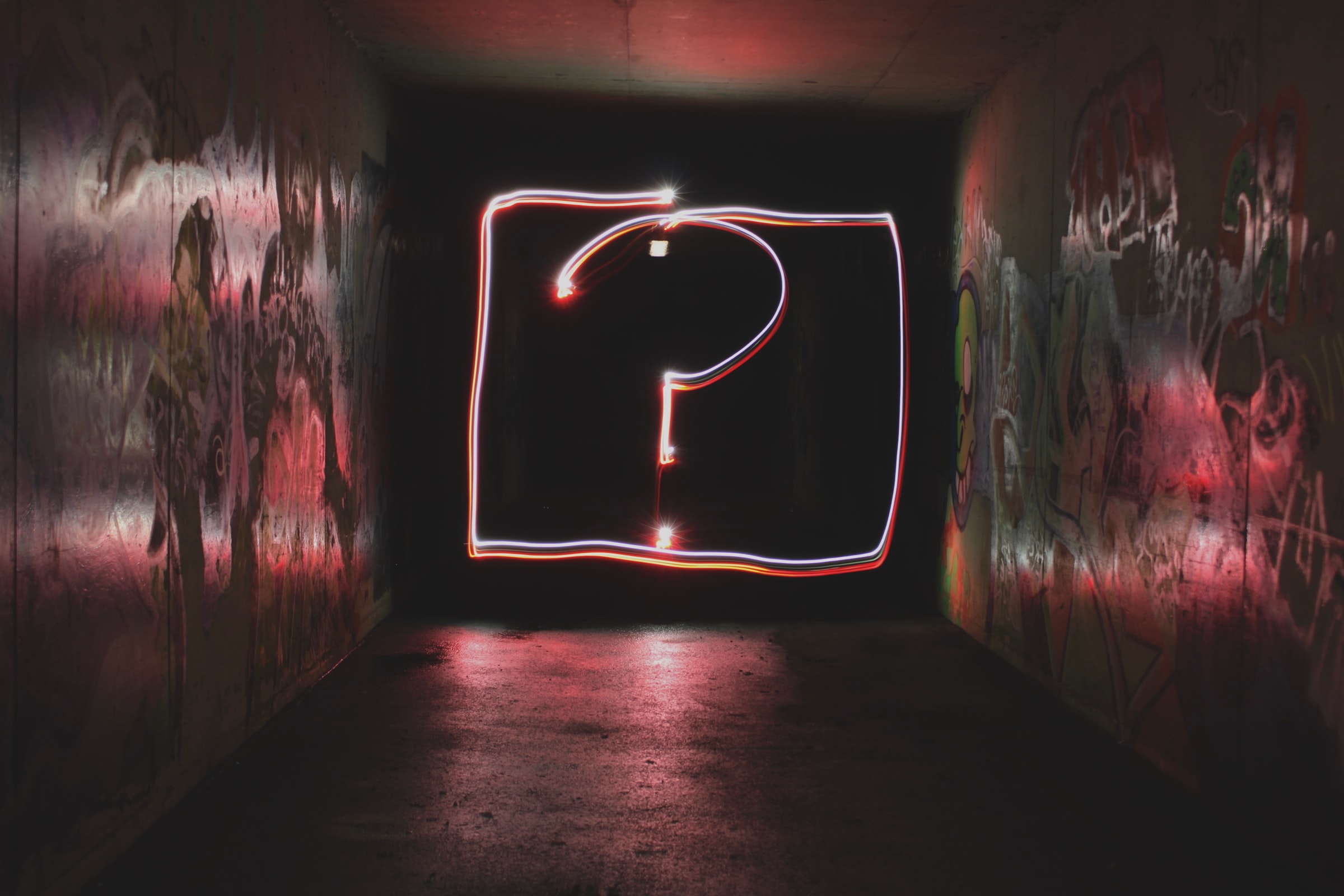 question mark neon signage by Emily Porter on Unsplash